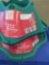 LOT OF 2 HOME ACCENTS HOLIDAY TREE STANDS, SIZES 6 FT AND 8 FT IN THE COLOR GREEN, BOTH APPEAR TO BE