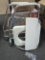 Shower Transport Chair in White. Comes in open box as a shown in photos. Appears to be new. Assembly