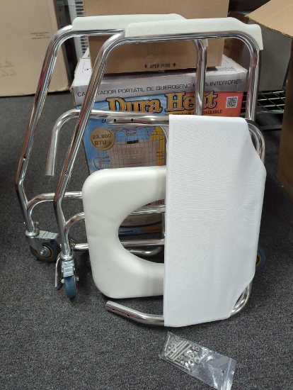 Shower Transport Chair in White. Comes in open box as a shown in photos. Appears to be new. Assembly