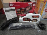 Home Accents Holiday 9 ft Christmas tree train set. Comes in open box as it's shown in photos.