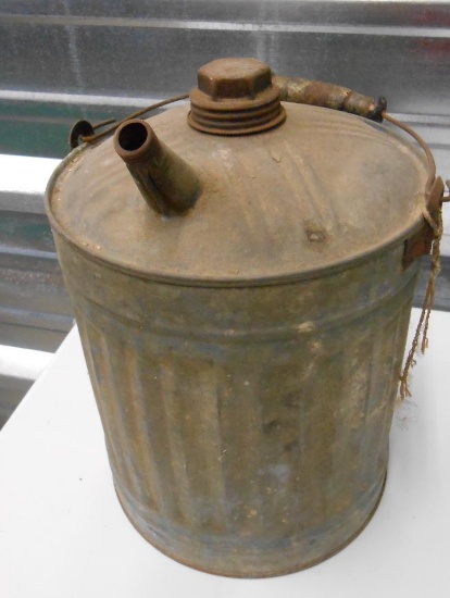 VINTAGE GALVANIZED GAS CAN ALL ITEMS ARE SOLD AS IS, WHERE IS, WITH NO GUARANTEE OR WARRANTY. NO