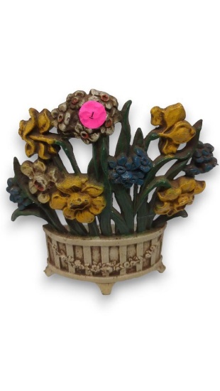 (FOY) Vintage cast iron door stop with a charming floral design, marked 52-675 and stamped J.W. for