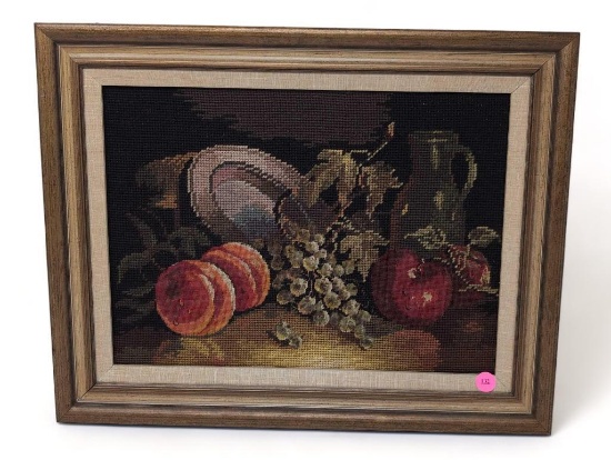 (FOYER) HAND MADE FRUIT STILL LIFE TAPESTRY DISPLAYED IN A BRUSHED GOLD TONE WOOD FRAME. IT MEASURES