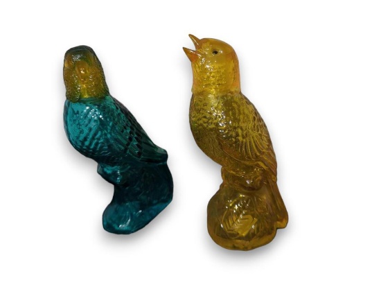 (LR) SET OF 2 CHARISMA COLOGNE GLASS BIRD BOTTLES, YELLOW, AND BLUE, BOTH ARE APPROX 4 5/8"H