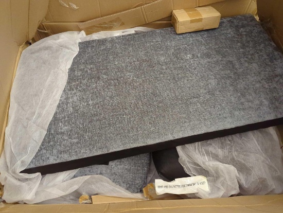 Grey Couch. Some assembly required. Comes in open box as is shown in photos. Appears to be new.