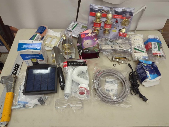 Mystery lot of various items including door knob kits, color, changing lamp, and much more! I'll