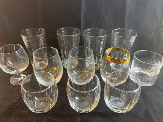 Lot of glassware. Clear with gold accents. One glass with cigar holder....