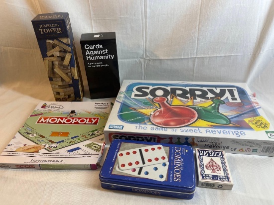 Board game lot: Sorry, Colorform Monopoly, Playing Cards, Cards Against Humanity, Dominoes, Jumbling