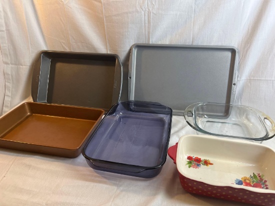 Lot of baking dishes. Various sizes. Non stick and glass....