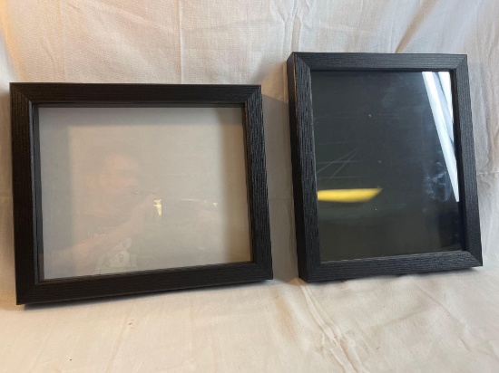 Set of two shadow box frames. Each has a reversible back so they can have a white or black