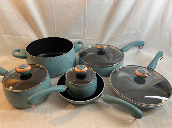 Paula Deen aqua gourmet cookware set with lids. Porcelain nonstick. Copper plated accents....