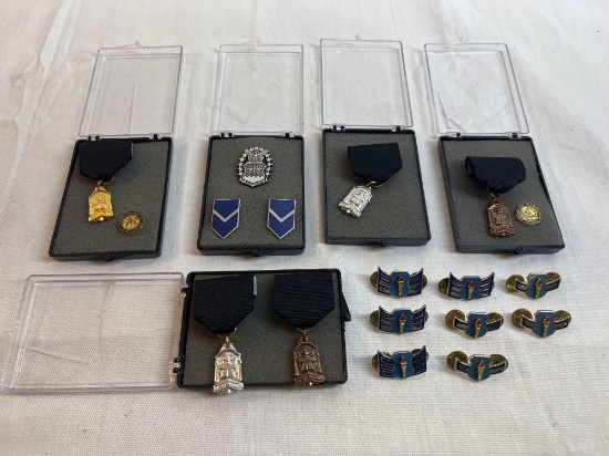 Lot of military pins. ROTC, merit awards, etc.