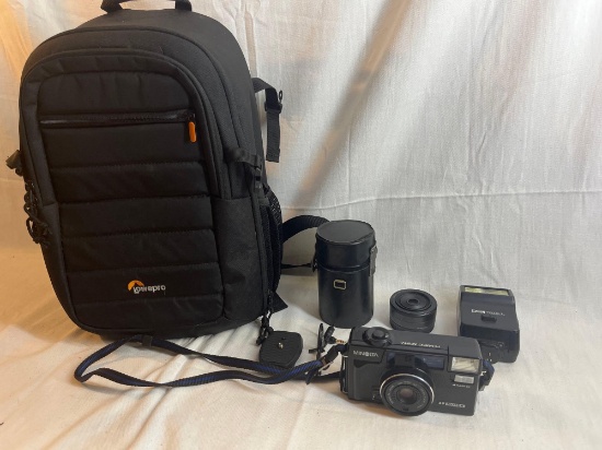 Camera lot: lowerpro soft case bag, tripod adapter, Minolta Hi-Matic...AF2-M, Canon Speedlite 188A,