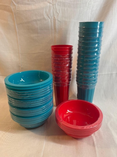 Lot of new plastic bowls and cups in red and turquoise.