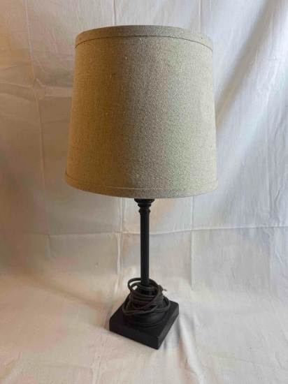 Small black table lamp with beige 7.5" shade....
