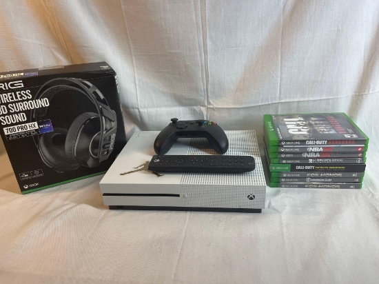 XBox One lot: console, remote, controller, games. RIG 3D surround sound wireless headphones.