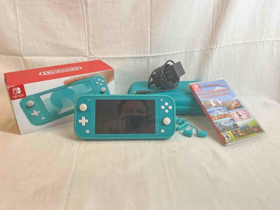 Nintendo Switch Lite including console, matching carrying case, earbuds with box.
