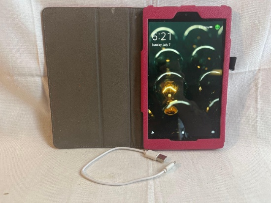 Tablet with case and charging cord