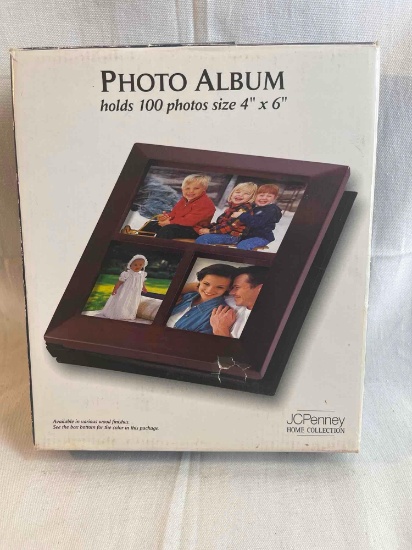Photo album with wood cover with frames. In box....