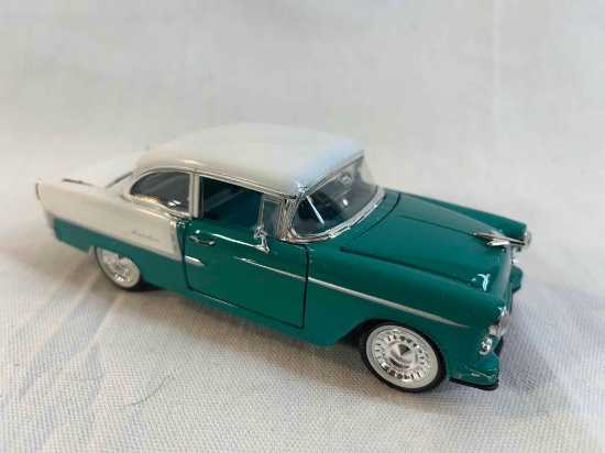 Arko 1955 Chevrolet Bel Air die-cast car...with certificate of authenticity from the...National Moto