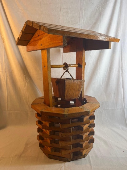 Large wooden wishing well. 31 inches tall....