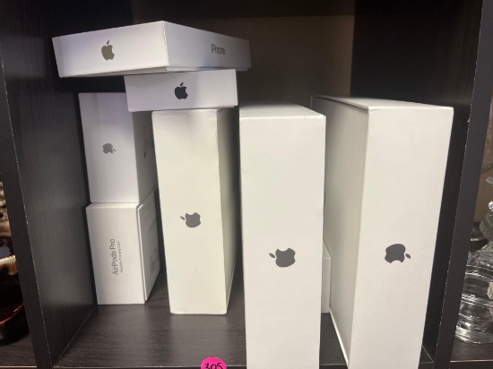 Lot of empty Apple product boxes.