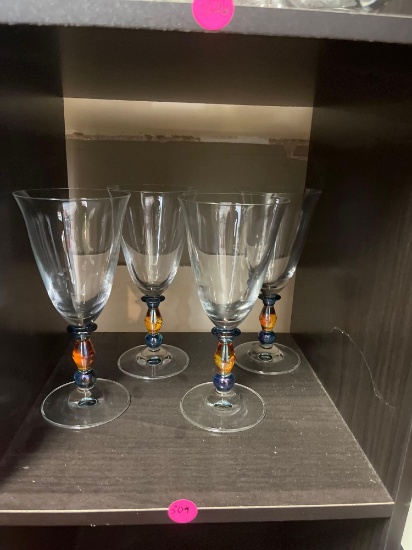 Set of four stemmed drinking glasses