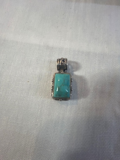 Sterling silver Kingman turquoise pendant. Marked 925