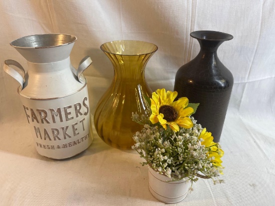 Assorted vases and jugs with flowers