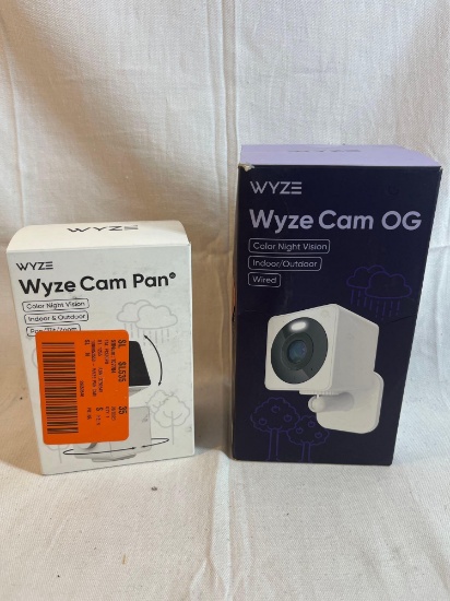 Lot of two Wyze cameras: Wyze Pan, Wyze...Cam OG in boxes. Color night vision, 2-way audio, 24/7