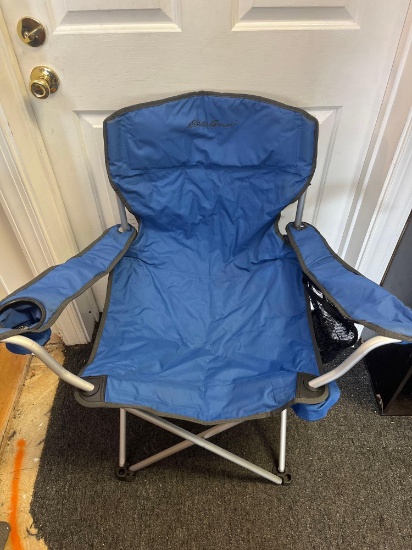 Set of two oversized aluminum captain's chairs by Eddie Bauer. Blue, with storage bags....