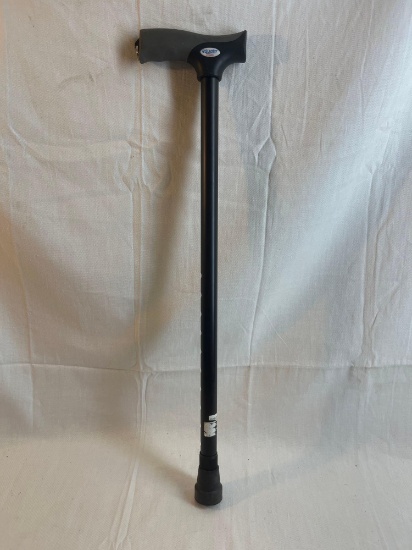 Equate brand walking cane with gripped handle. 23" tall.