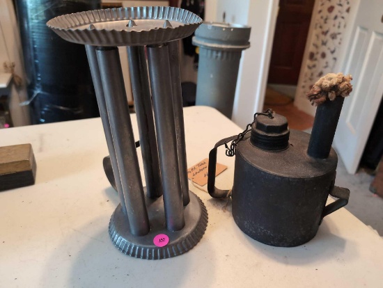 (BR2) 2 PC. LOT TO INCLUDE A TIN CANDLE STICK MOLD & A VINTAGE CYORR TORCH LANTERN.