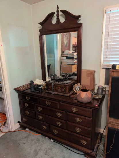 (BR3) KINKAID DARK STAINED ELEVEN (DR)AWER DRESSER & MIRROR. CHIPPENDALE STYLE PULLS. MEASURES 61"W