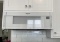 Whirlpool 1.1 cu. ft. Over the Range Low Profile Microwave Hood Combination in White, Retail Price