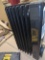 Pelonis 1,500-Watt Oil-Filled Radiant Electric Space Heater with Thermostat, Retail Price $55,