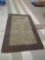 MODERN MACHINE MADE OLIVE AND BROWN AREA RUG, 95 3/8