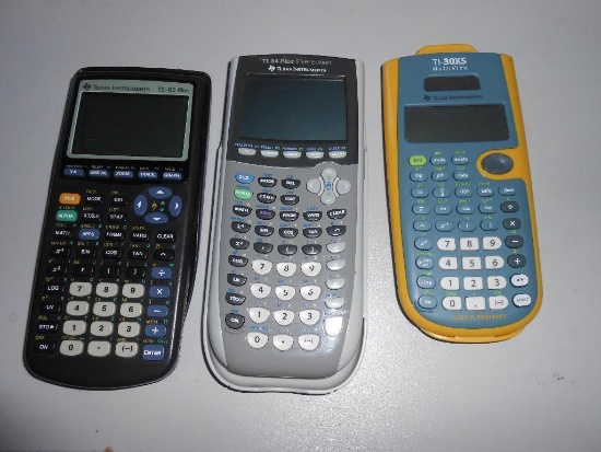 THREE TEXAS INSTRUMENT CALCULATORS ALL ITEMS ARE SOLD AS IS, WHERE IS, WITH NO GUARANTEE OR