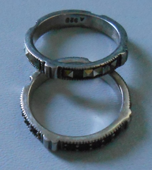 2 BEAUTIFUL 925 RINGS WITH STONES ALL ITEMS ARE SOLD AS IS, WHERE IS, WITH NO GUARANTEE OR WARRANTY.