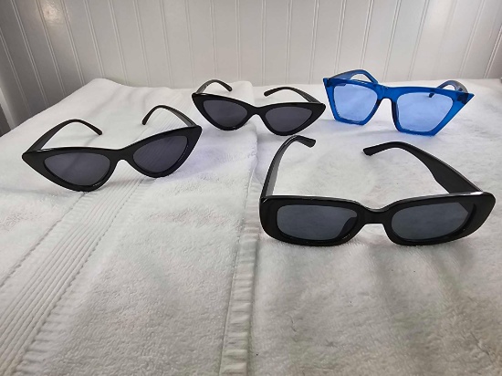 4 Women's Fashion Sunglasses. 1 pair is Foster Grant.