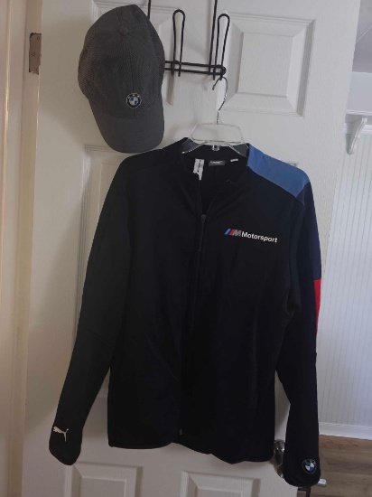 BMW Lot. Includes BMW Motorsport Puma Jacket size M and hat.