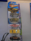 A LOT OF 5 HOT WHEELS NEW IN PACK ALL ITEMS ARE SOLD AS IS, WHERE IS, WITH NO GUARANTEE OR WARRANTY.