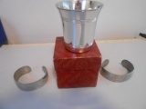 STIFF PEWTER CUP WITH 2 PEWTER BRACELETS ALL ITEMS ARE SOLD AS IS, WHERE IS, WITH NO GUARANTEE OR
