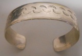 TESTED STERLING BANGLE BRACELET ALL ITEMS ARE SOLD AS IS, WHERE IS, WITH NO GUARANTEE OR WARRANTY.