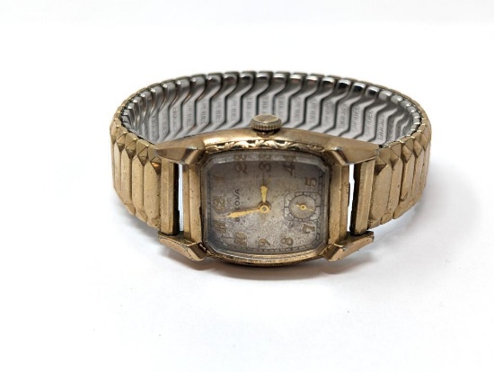 VINTAGE BULOVA 17 JEWEL 10BT SWISS WRIST WATCH WITH 10K ROLLED GOLD PLATE HOUSING, GOLD TONE &