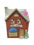 1990 Ceramic Light Up Christmas Village Toy Store 3.5 in x 5 in x 6 in
