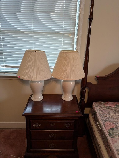 A pair of white ginger jar style lamps with shade - measures 23.5 inches tall