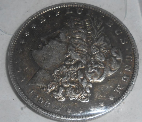 VINTAGE 1890 MORGAN SILVER DOLLAR ALL ITEMS ARE SOLD AS IS, WHERE IS, WITH NO GUARANTEE OR WARRANTY.