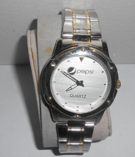 PEPSI QUARTZ WATCH ALL ITEMS ARE SOLD AS IS, WHERE IS, WITH NO GUARANTEE OR WARRANTY. NO REFUNDS OR