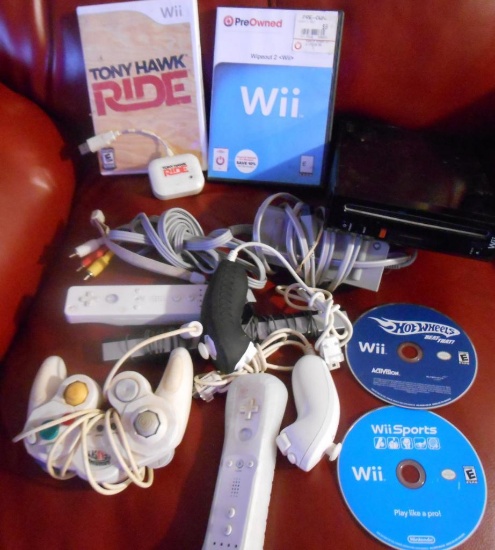 WII GAME SYSTEM WITH ACCESSORIES ALL ITEMS ARE SOLD AS IS, WHERE IS, WITH NO GUARANTEE OR WARRANTY.